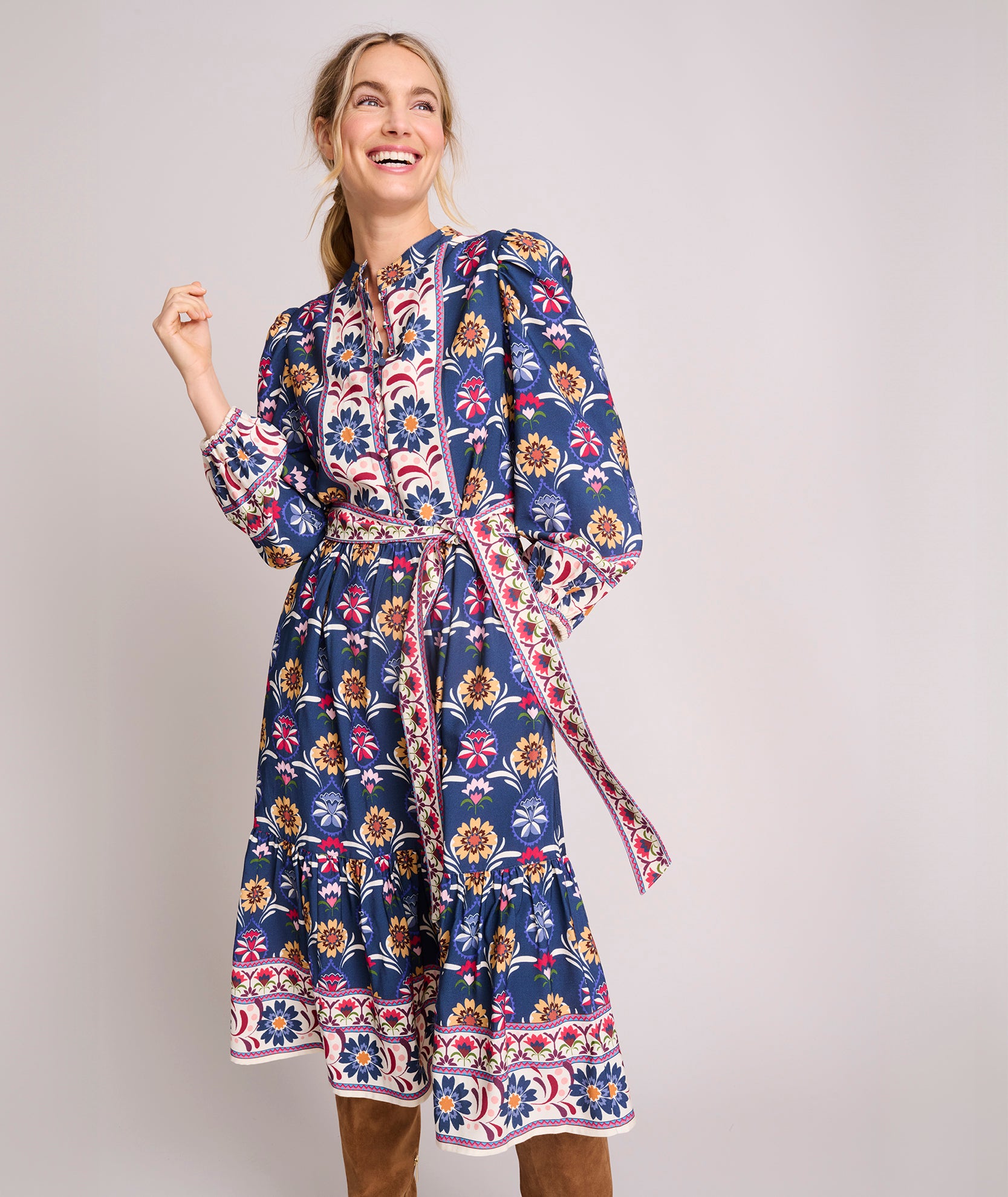 Model is wearingSoft Twill Floral Border Print Flora Dress. 