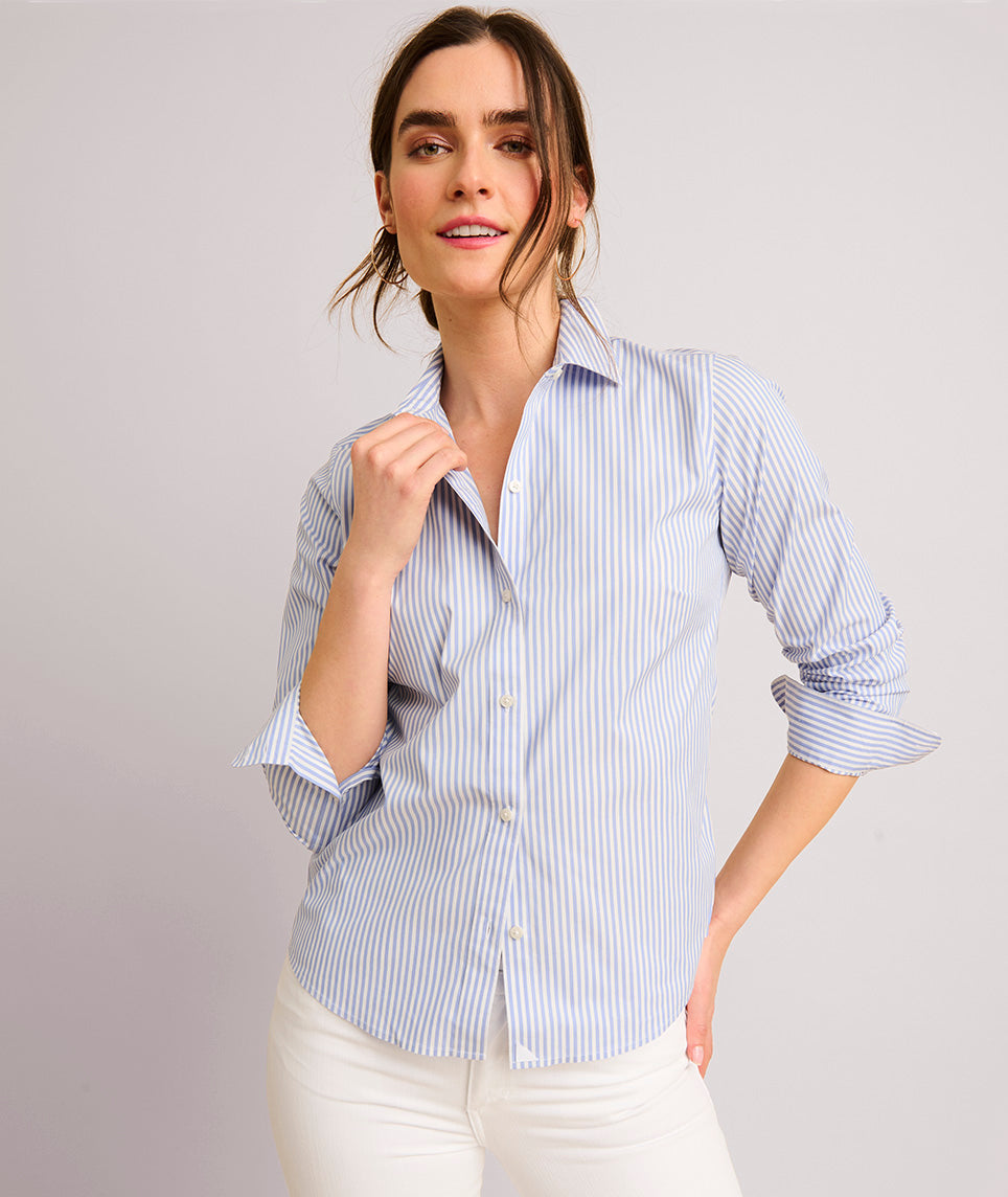 Model is wearing UNTUCKit Bella shirt in blue.