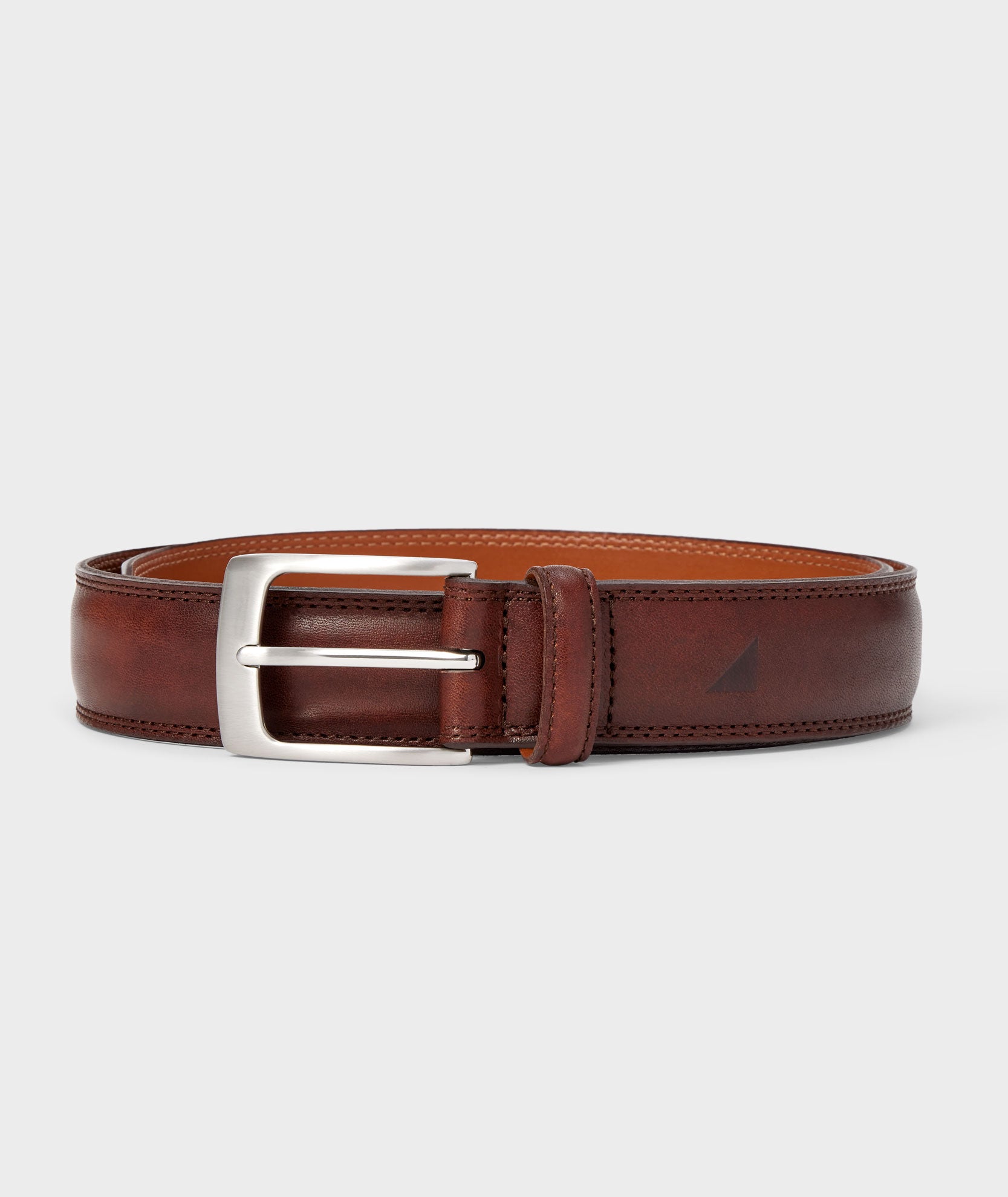 UNTUCKit Double Stitch Leather Belt in Walnut Brown.