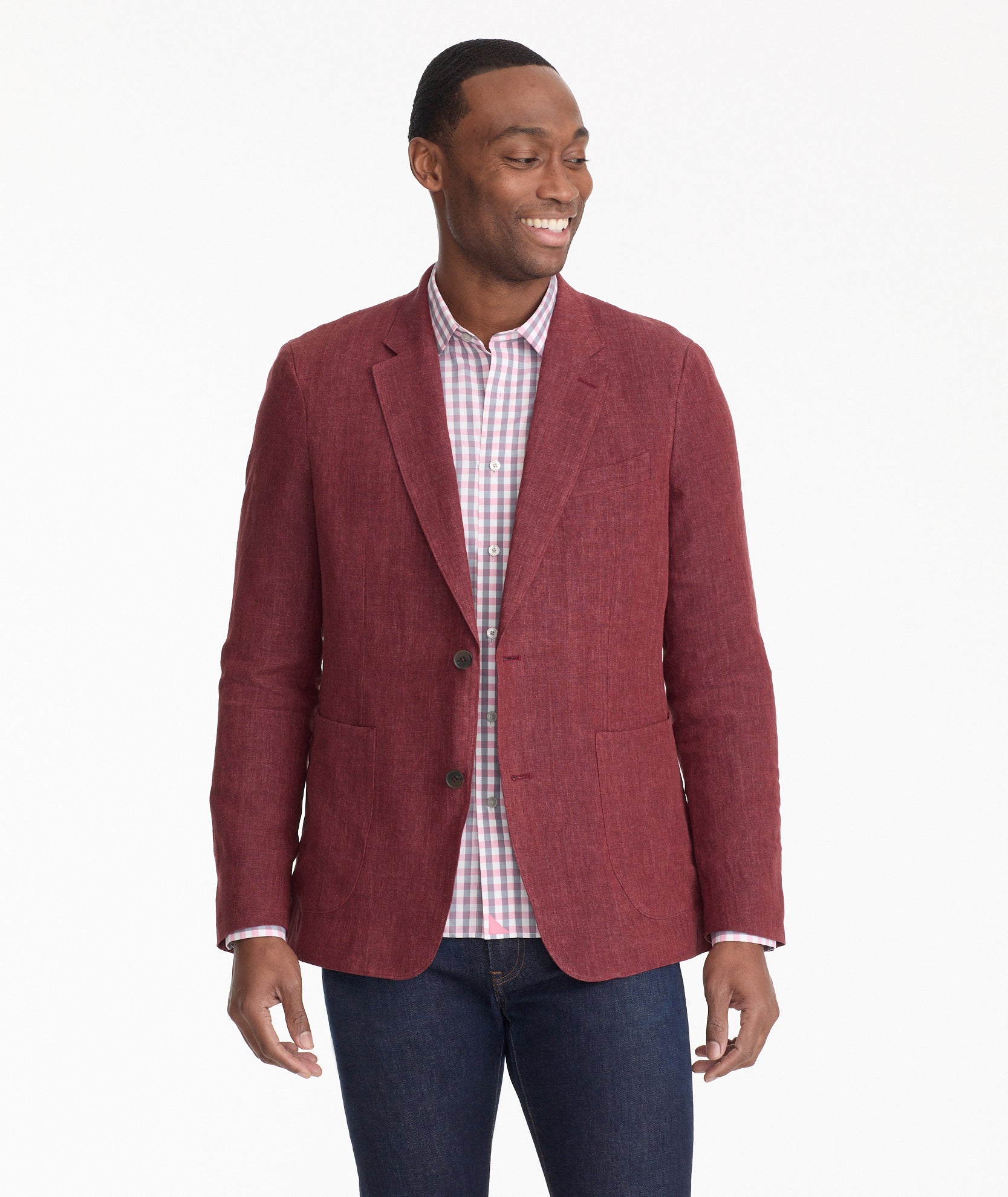 Model is wearing UNTUCKit crawford sport coat in solid red.