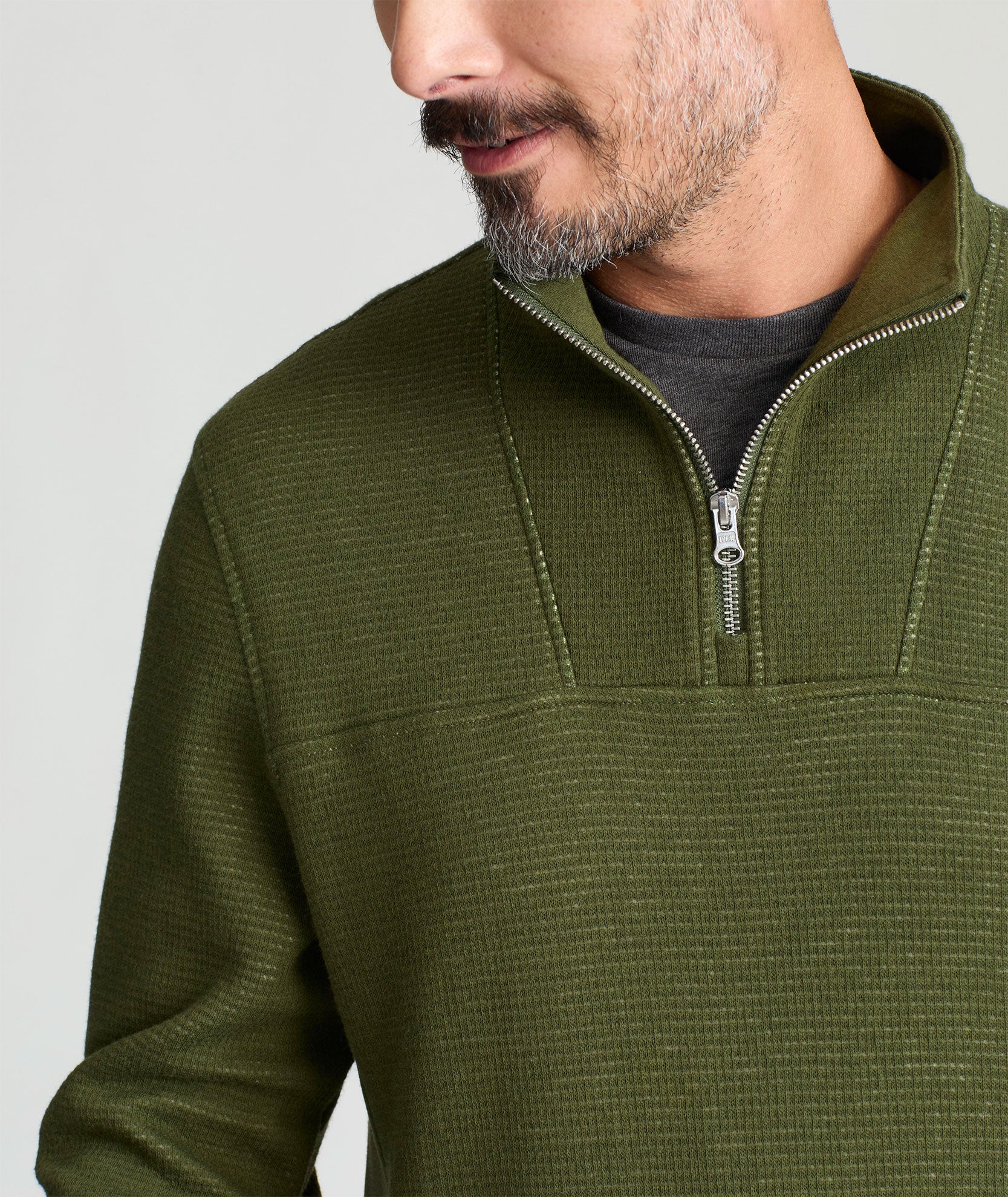 Model is wearing UNTUCKit Verzaro sweatshirt in green.