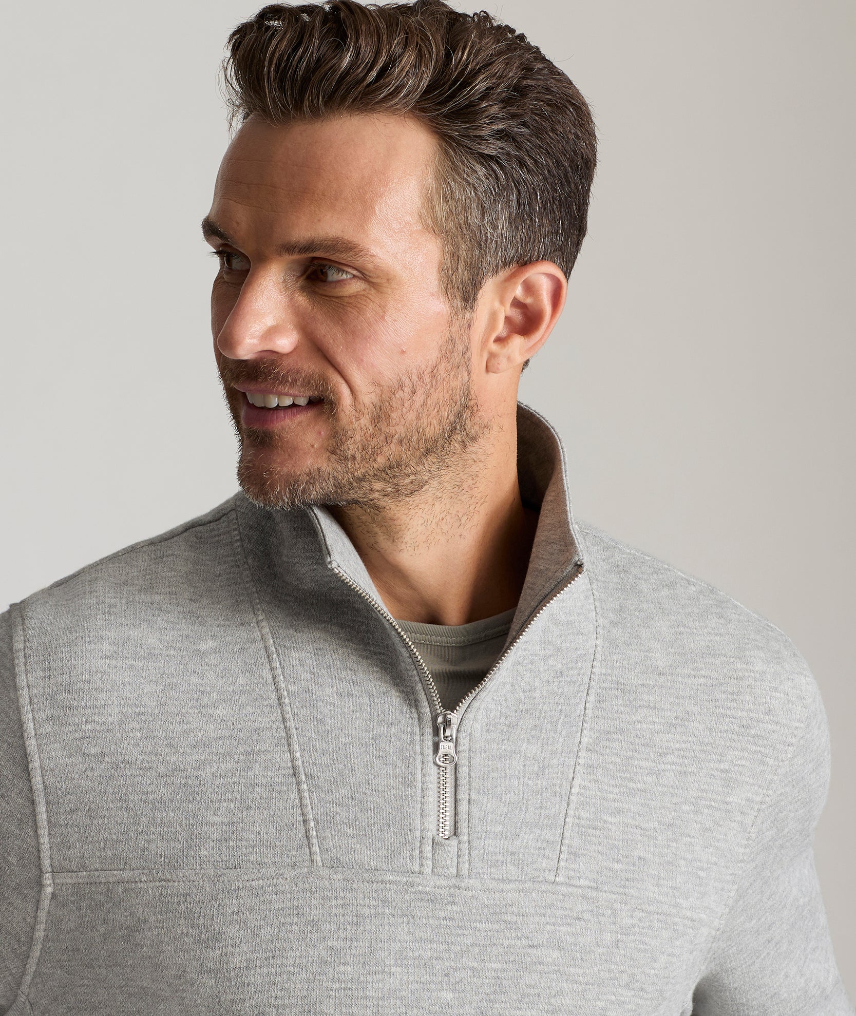 Model is wearing UNTUCKit Verzaro sweatshirt in gray.