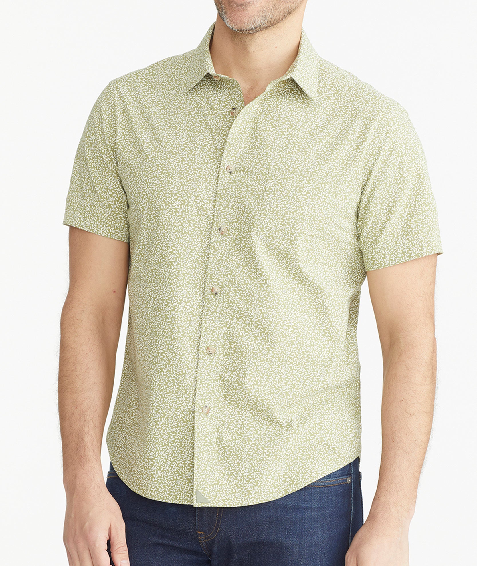 Model is wearing UNTUCKit Olive Vine Print  Cotton Short-Sleeve Buckley Shirt