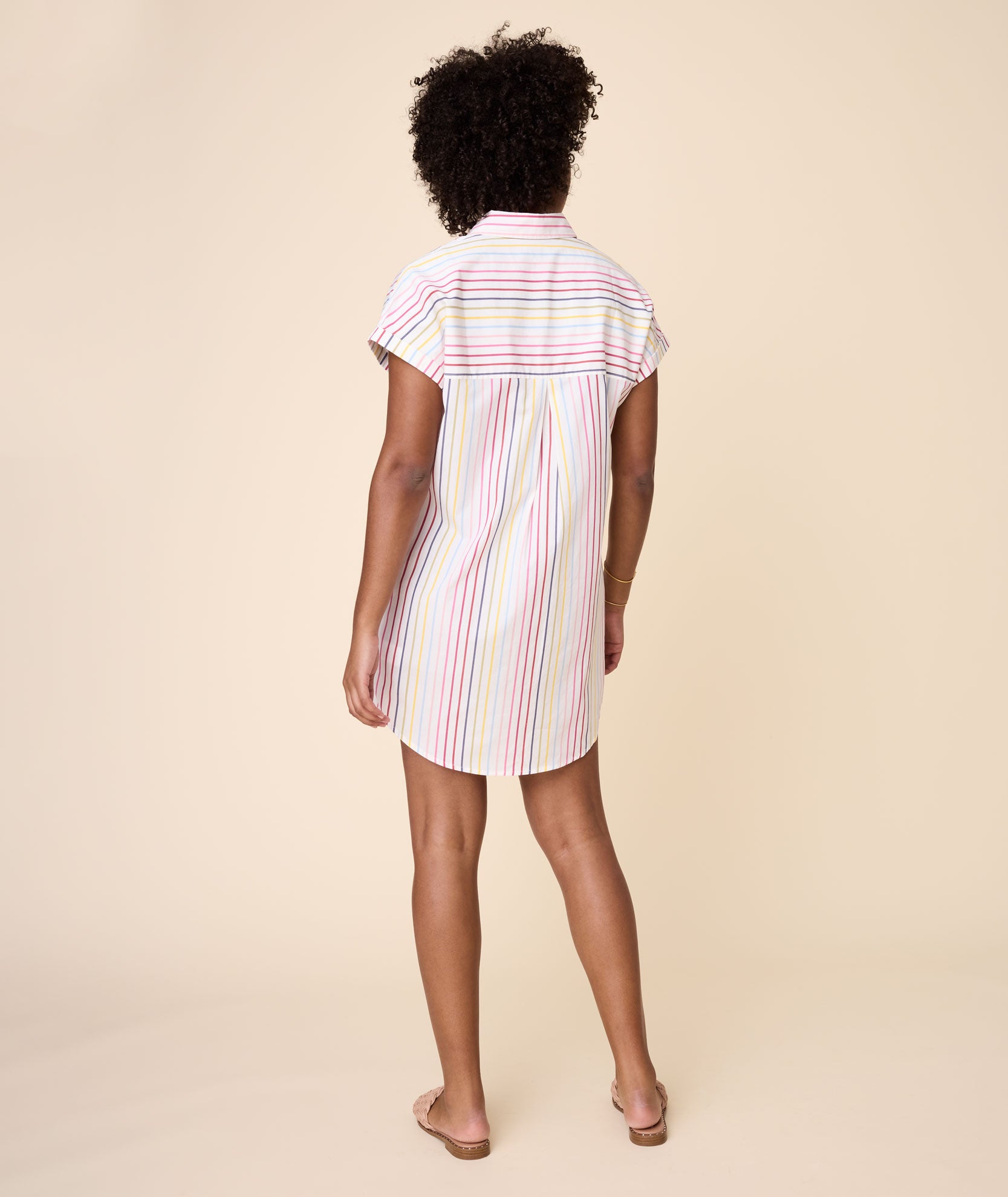 Model is wearing UNTUCKit White with Multicolor Stripe Eleanor Dress.