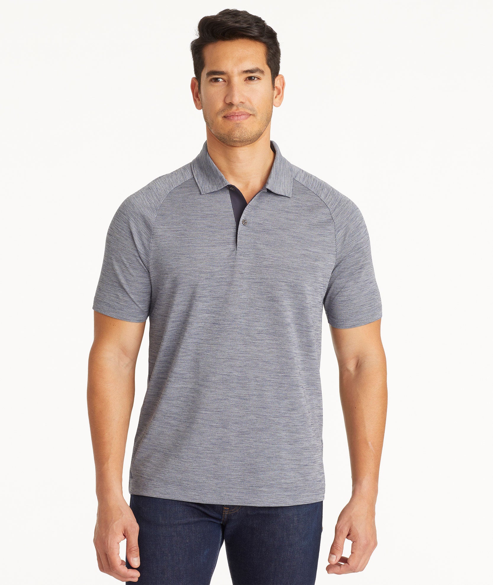 Model wearing an UNTUCKit Dark Blue No Sweat Heathered Polo