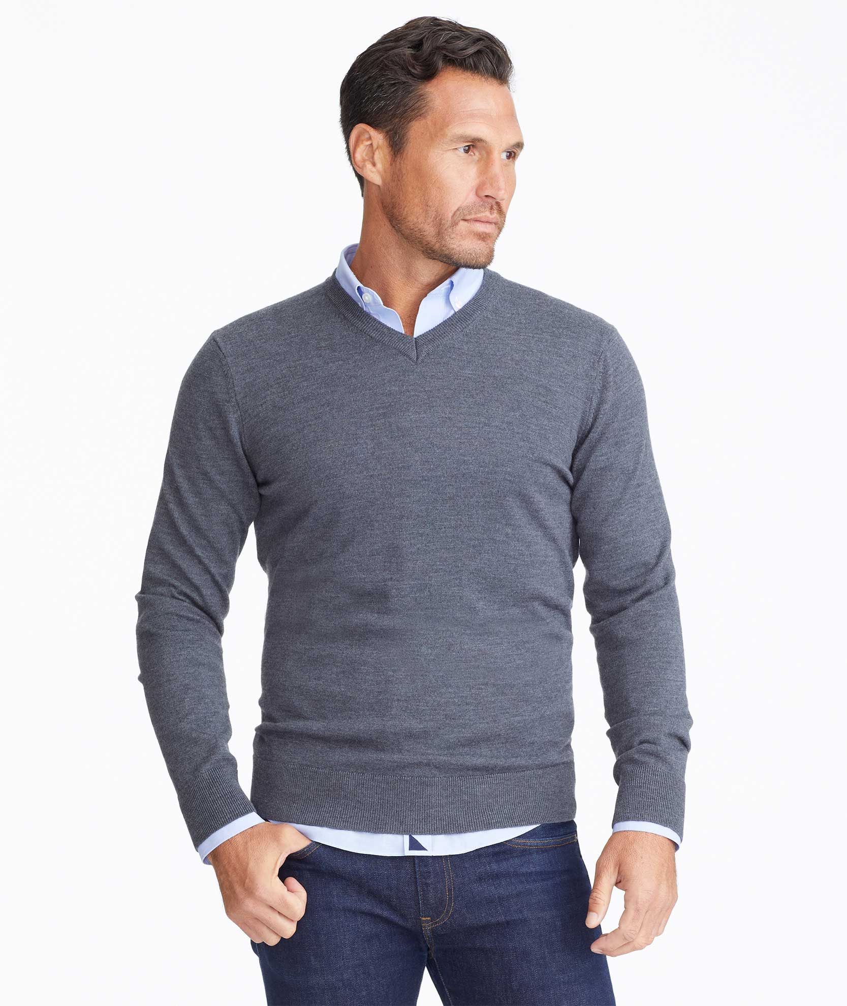 Model wearing a Dark Grey Merino Wool V-Neck Sweater